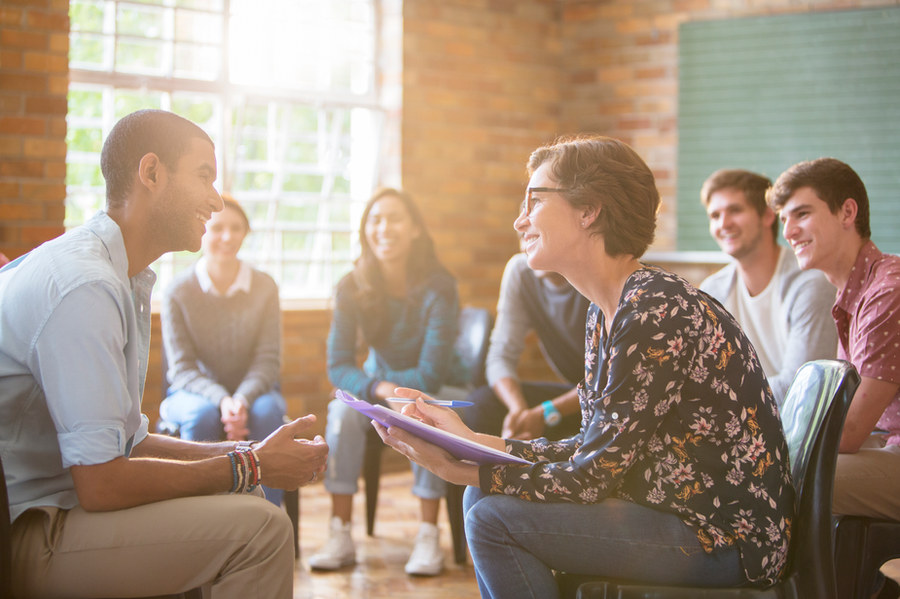 A group of people in discussion